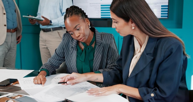 Handwritten ledger and pen on a wooden surface
